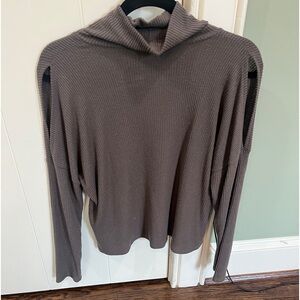 Turtleneck with open shoulder